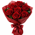 Seven red roses bouquet with red cloth wrapping and ribbon